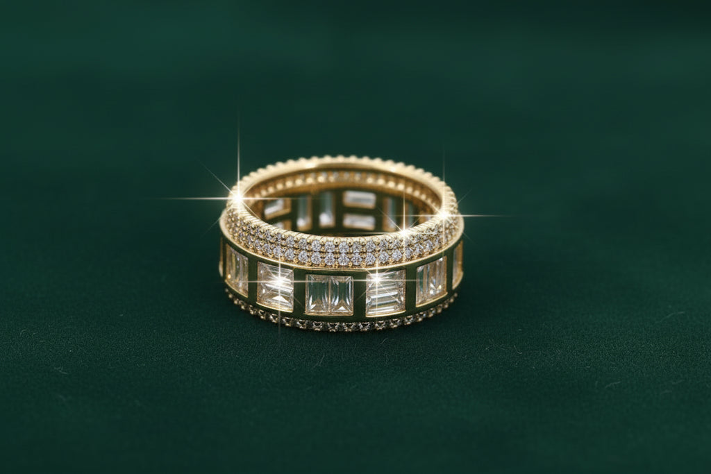 Gold ring with embedded diamonds on a green background