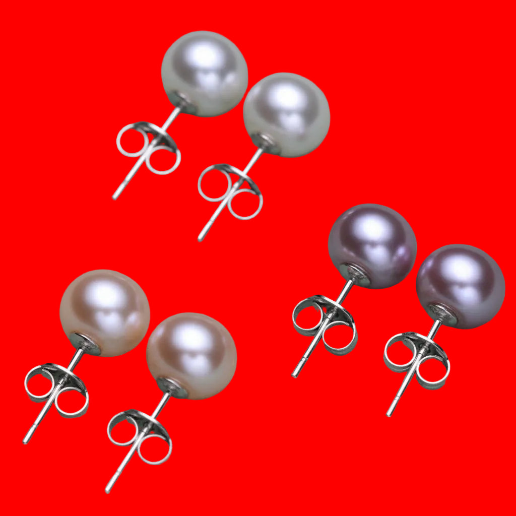 Set of pearl earrings in various colors on a white background
