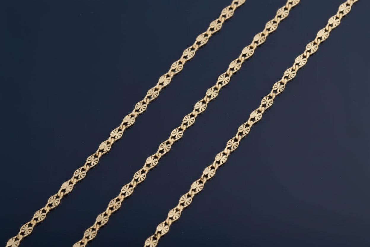 Gold chain on a white background