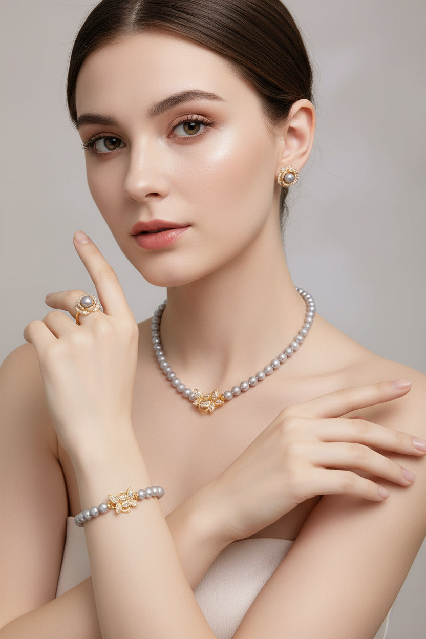 Pearl necklace and earrings set in a jewelry box