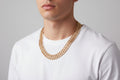 Gold chain necklace with Xuping Jewelry logo on a white background