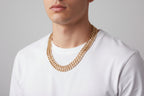 Gold chain necklace with Xuping Jewelry logo on a white background