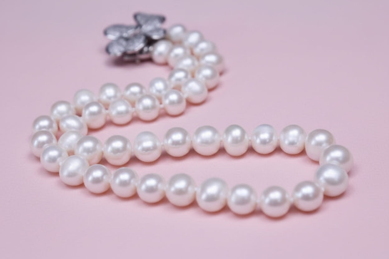 Pearl necklace on a red background