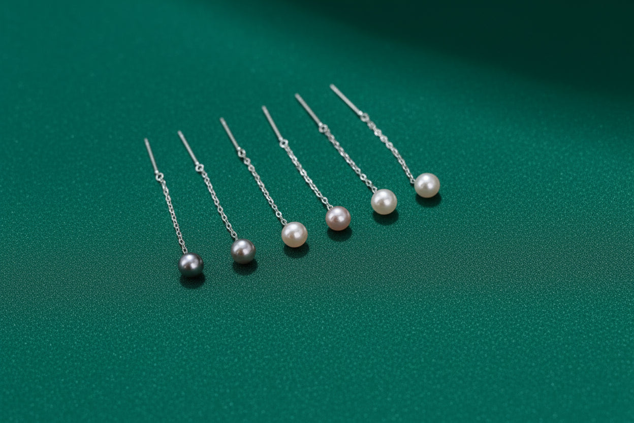Set of pearl hairpins on a soft fabric background